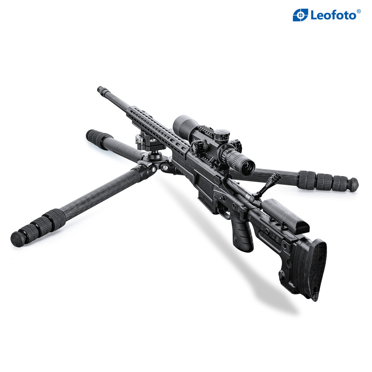 Scoped rifle on a Leofoto SA-series tripod with the legs spread flat for a low position