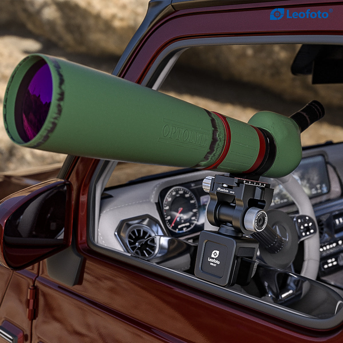 Spotting scope mounted on a Leofoto WN-01 + SW-02 car window clamp, viewed from outside the vehicle.