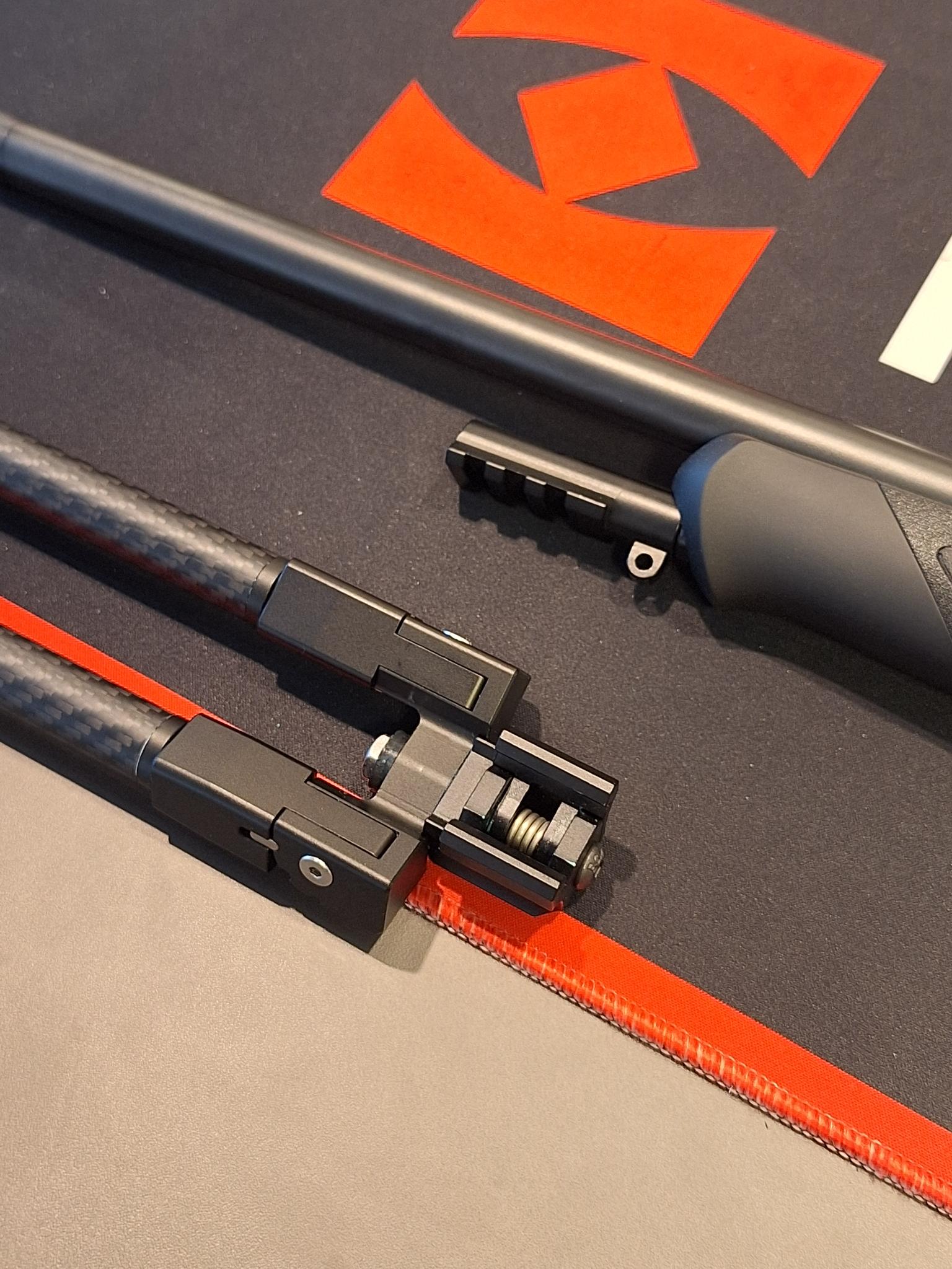 Picatinny adapter for Sauer 404/505 components showcasing mounting options and carbon features.