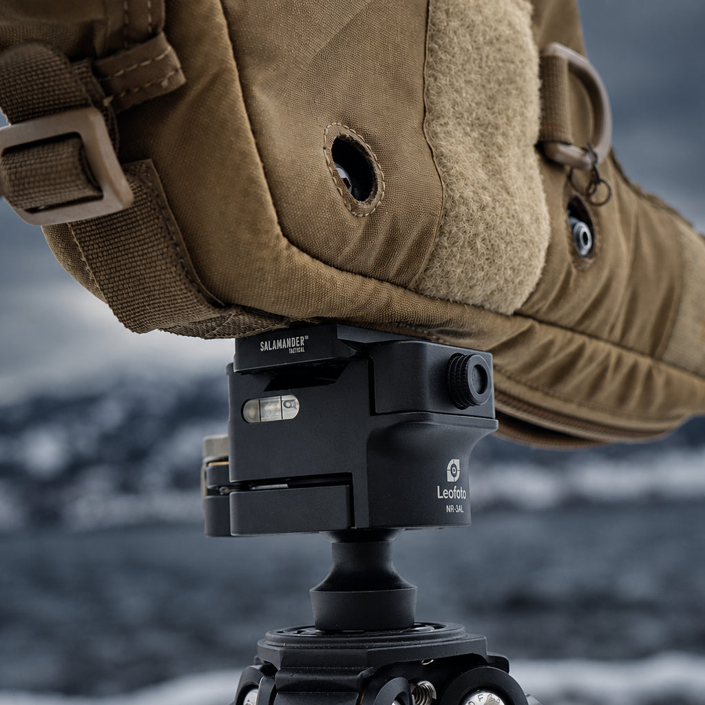 Arca spotting scope adapter plate mounted on tripod