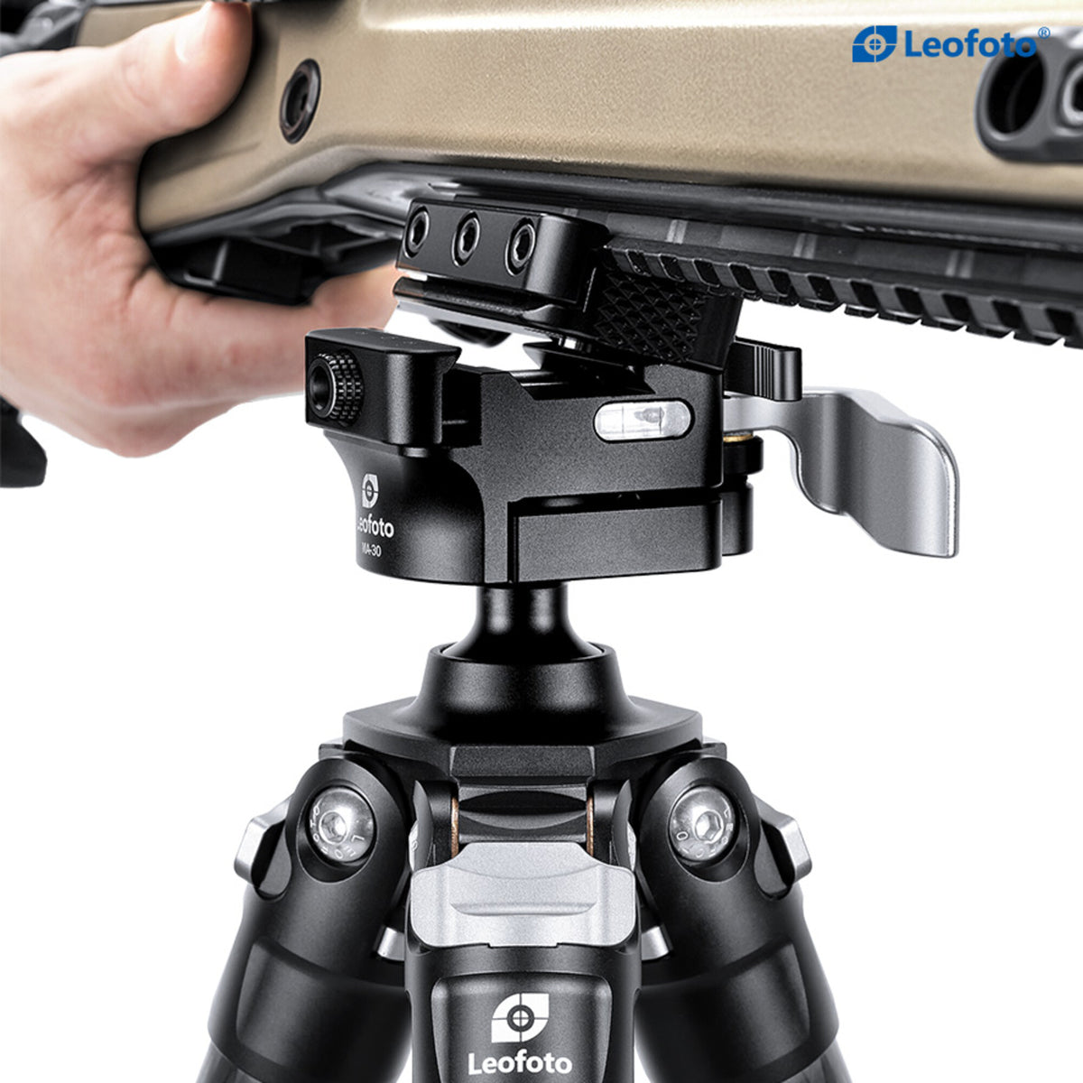 Close-up of a rifle's Picatinny rail secured in a Leofoto MA-30L clamp